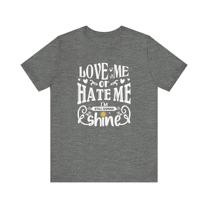 Women's good vibes graphic tee stating 'Love me or hate me, I'm still gonna shine' in color deep heather
