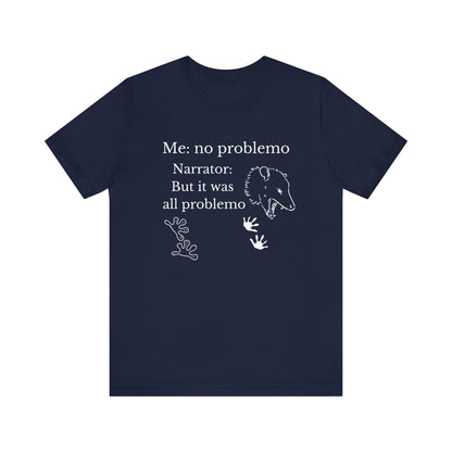 Funny graphic tee stating 'Me: no problemo - Narrator: but it was all problemo' in color navy