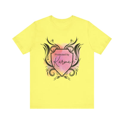 graphic tee stating Protected By Karma in color yellow
