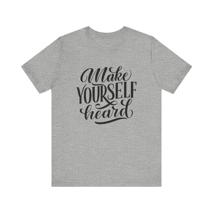 Good vibes graphic tee stating 'Make Yourself Heard' in color athletic heather