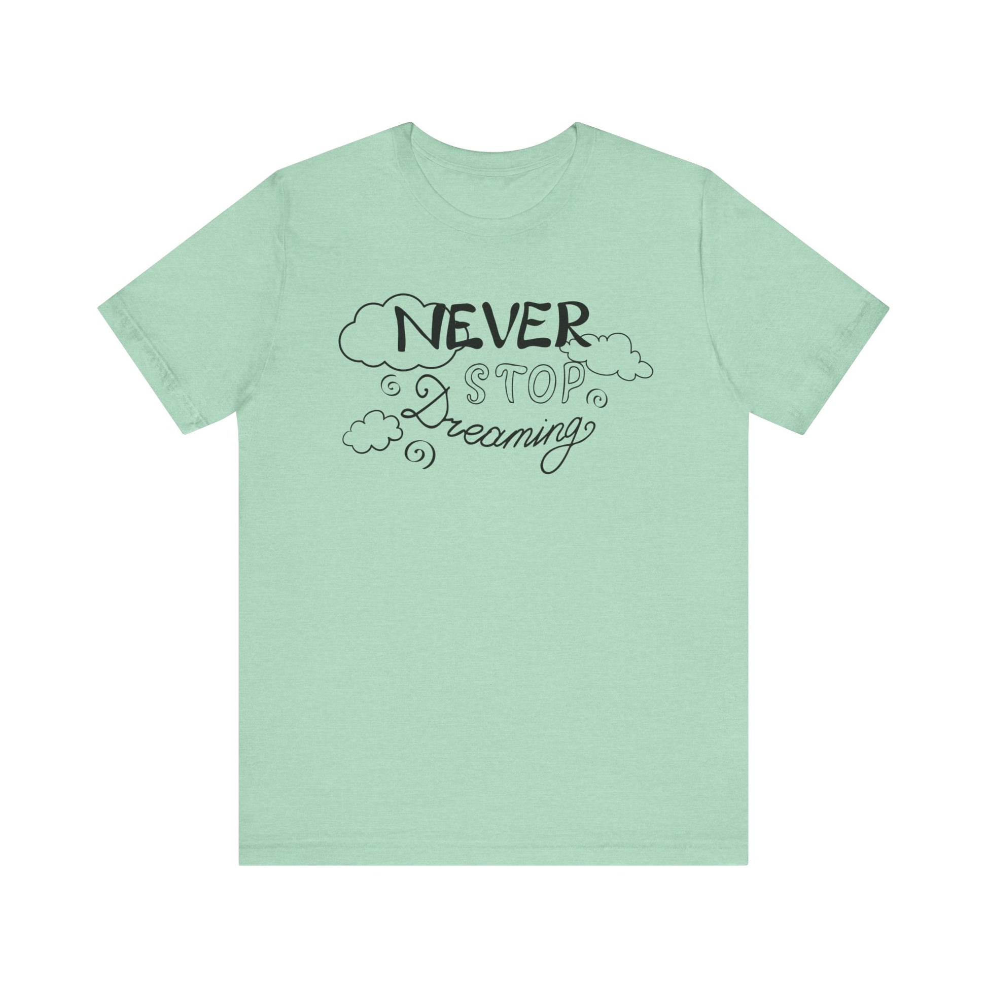 Good vibes women's tee stating 'Never Stop Dreaming' in color mint heather