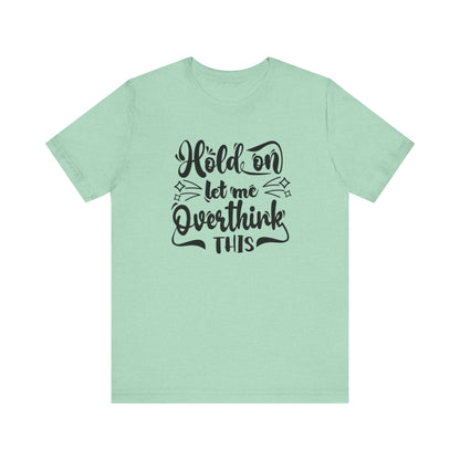Unisex graphic tee stating 'Hold on let me overthink this' in color mint heather