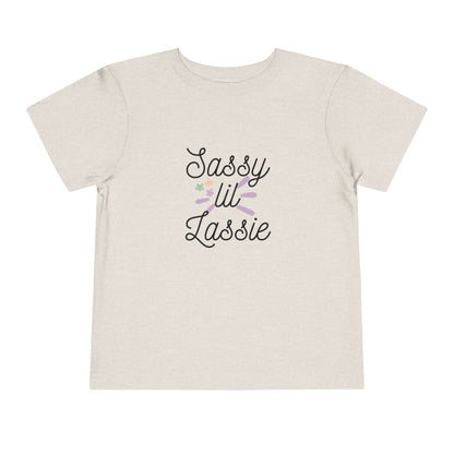 Comfortable funny graphic toddler tee stating 'Sassy Lil Lassie' in color  heather dust