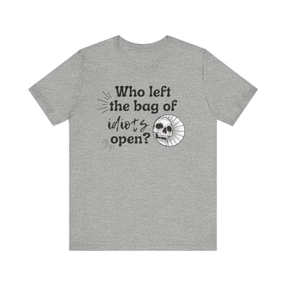 Unisex graphic tee stating 'Who left the bag of idiots open?' in color athletic heather