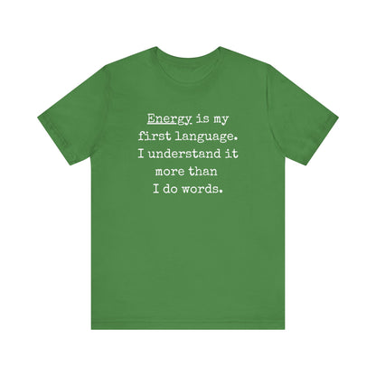comfortable good vibes tee stating Energy is my first language. I understand it more than I do words. in color leaf