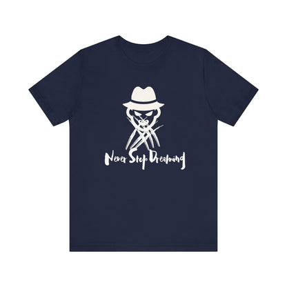 Comfortable Halloween unisex tee with Freddy Kruegar that states 'Never Stop Dreaming' in color navy