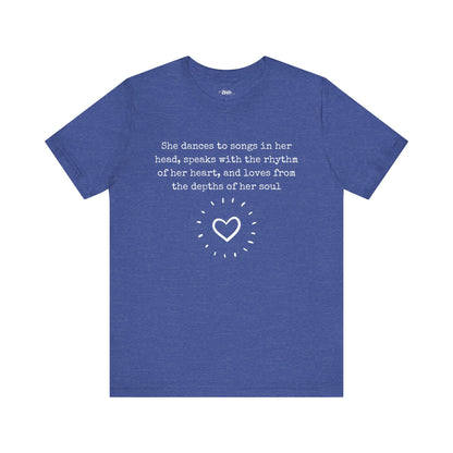 Comfortable good vibes graphic t-shirt stating 'She dances to songs in her head, speaks with the rhythm of her heart, and loves from the depths of her soul' in color true royal heather