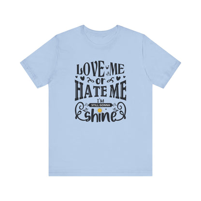 Women's good vibes graphic tee stating 'Love me or hate me, I'm still gonna shine' in color baby blue