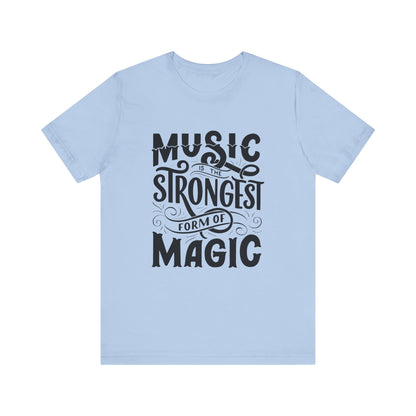 A comfortable good vibes tee stating 'Music is the strongest form of magic' in color baby blue