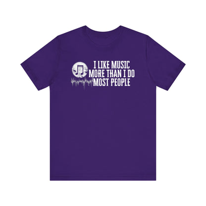 Unisex graphic cotton tee stating 'I like music more than I do most people' in color purple