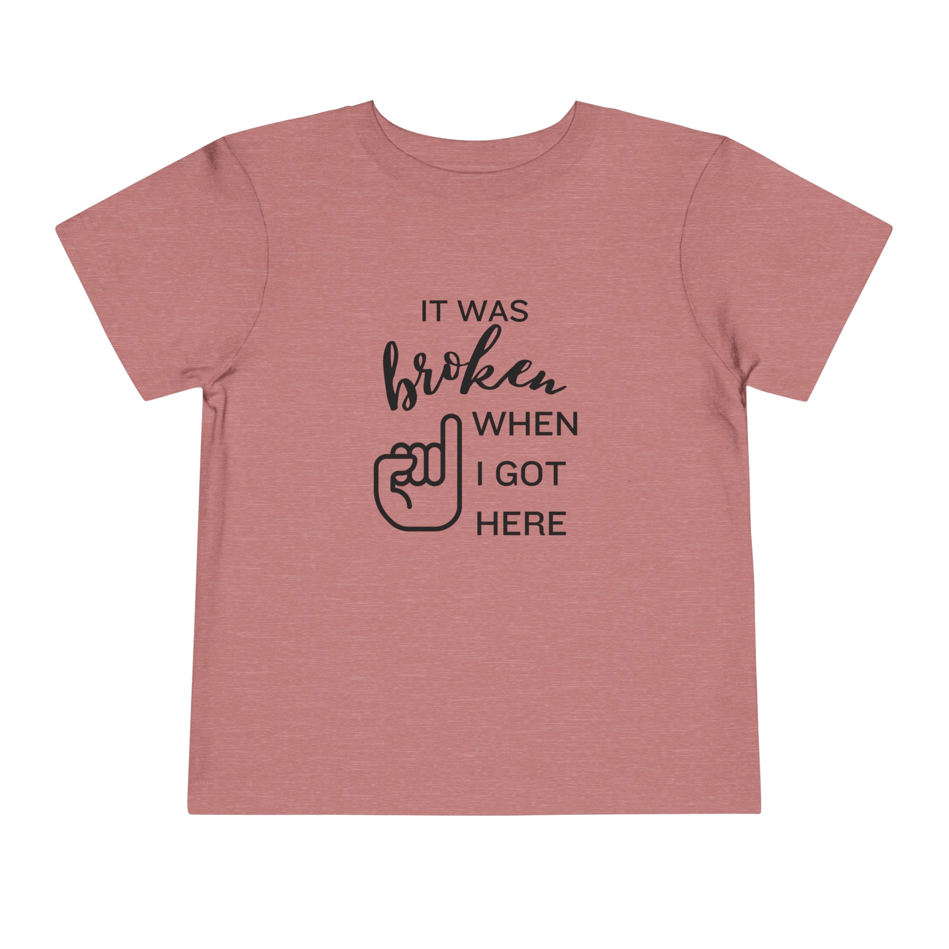 Comfortable funny graphic toddler tee stating 'It was broken when I got here' in color heather mauve