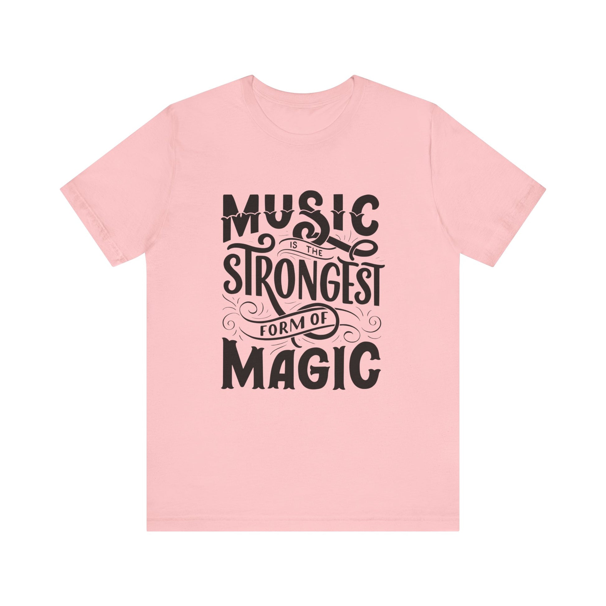 A comfortable good vibes tee stating 'Music is the strongest form of magic' in color pink