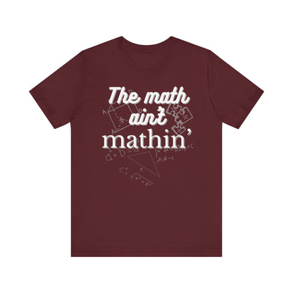 Comfortable witty graphic t-shirt stating The Math Ain't Mathin in color maroon