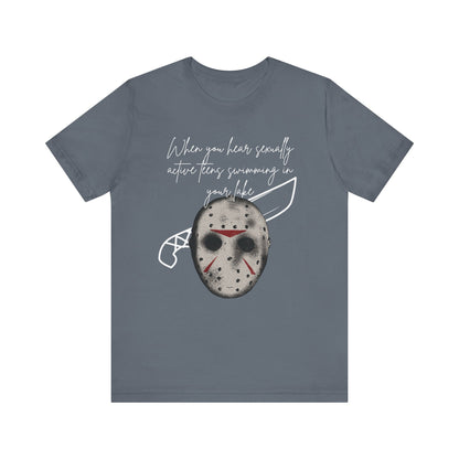Unisex Comfortable Halloween tee with Jason mask that says 'When you hear sexually active teens swimming in your lake' in color steel blue