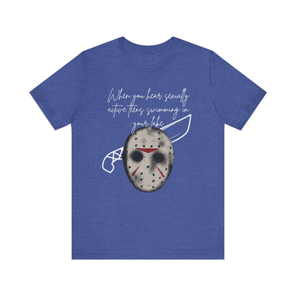 Unisex Comfortable Halloween tee with Jason mask that says 'When you hear sexually active teens swimming in your lake' in color true royal heather