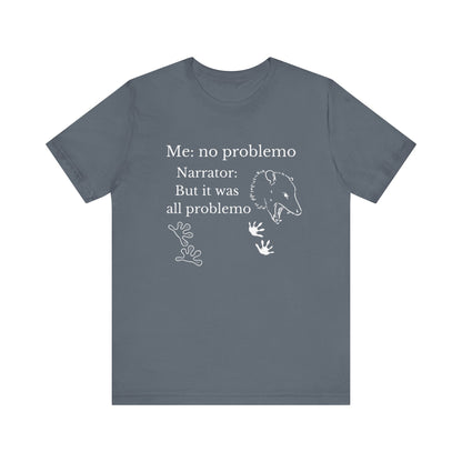 Funny graphic tee stating 'Me: no problemo - Narrator: but it was all problemo' in color steel blue