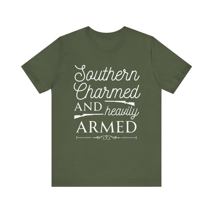 Adult unisex t-shirt stating 'Southern Charmed and Heavily Armed' in color military green