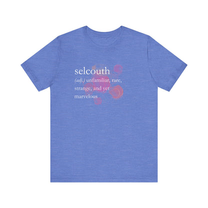 Comfortable women's good vibes tee that states 'selcouth (adj.) unfamiliar, rare, strange, and yet marvelous' in color heather columbia blue