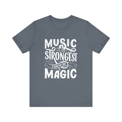 A comfortable good vibes tee stating 'Music is the strongest form of magic' in color steel blue