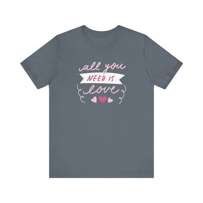 Comfortable Women's Graphic Tee Stating 'All You Need Is Love' in color steel blue