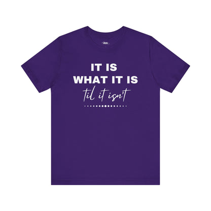 Funny graphic tee stating It Is What It Is, Til It Isn't in color purple