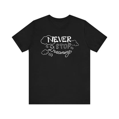Good vibes women's tee stating 'Never Stop Dreaming' in color black