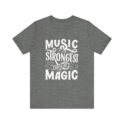 A comfortable good vibes tee stating 'Music is the strongest form of magic' in color deep heather