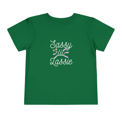 Comfortable funny graphic toddler tee stating 'Sassy Lil Lassie' in color  kelly