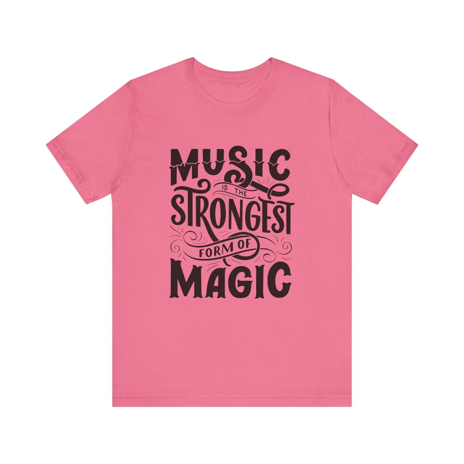 A comfortable good vibes tee stating 'Music is the strongest form of magic' in color charity pink