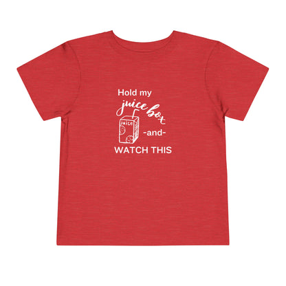 Comfortable funny graphic toddler tee stating 'Hold my juice box and watch this' in color heather red