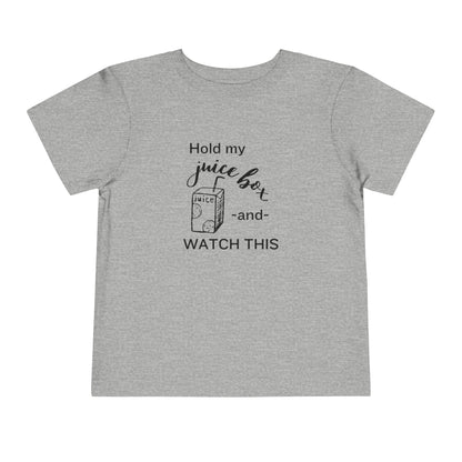 Comfortable funny graphic toddler tee stating 'Hold my juice box and watch this' in color athletic heather