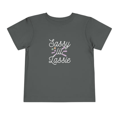 Comfortable funny graphic toddler tee stating 'Sassy Lil Lassie' in color  asphalt