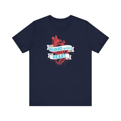 A cotton graphic tee stating 'Guard Your Heart' in color navy