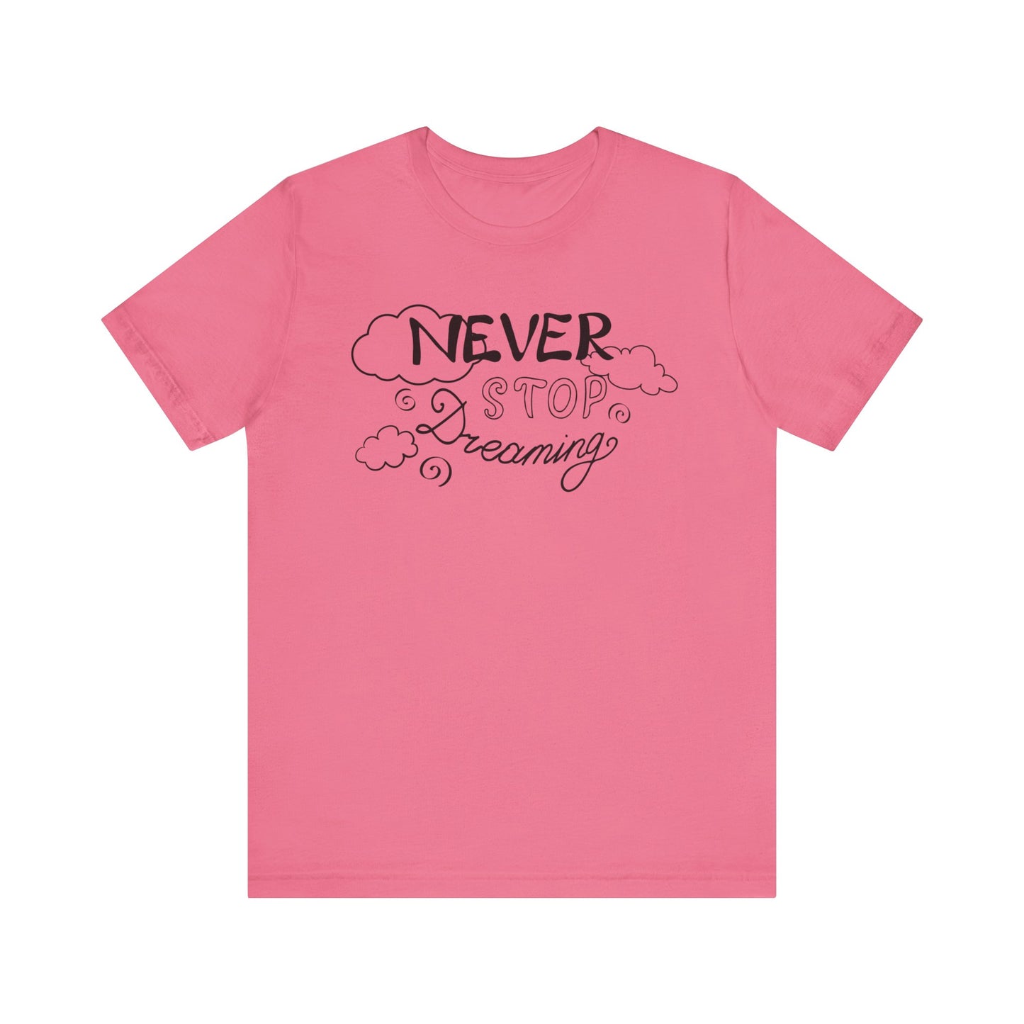 Good vibes women's tee stating 'Never Stop Dreaming' in color charity pink