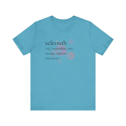 Comfortable women's good vibes tee that states 'selcouth (adj.) unfamiliar, rare, strange, and yet marvelous' in color aqua