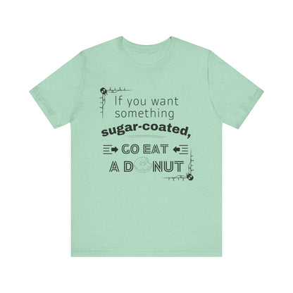Unisex comfortable tee stating 'If you want something sugar-coated, go eat a donut' in color mint heather