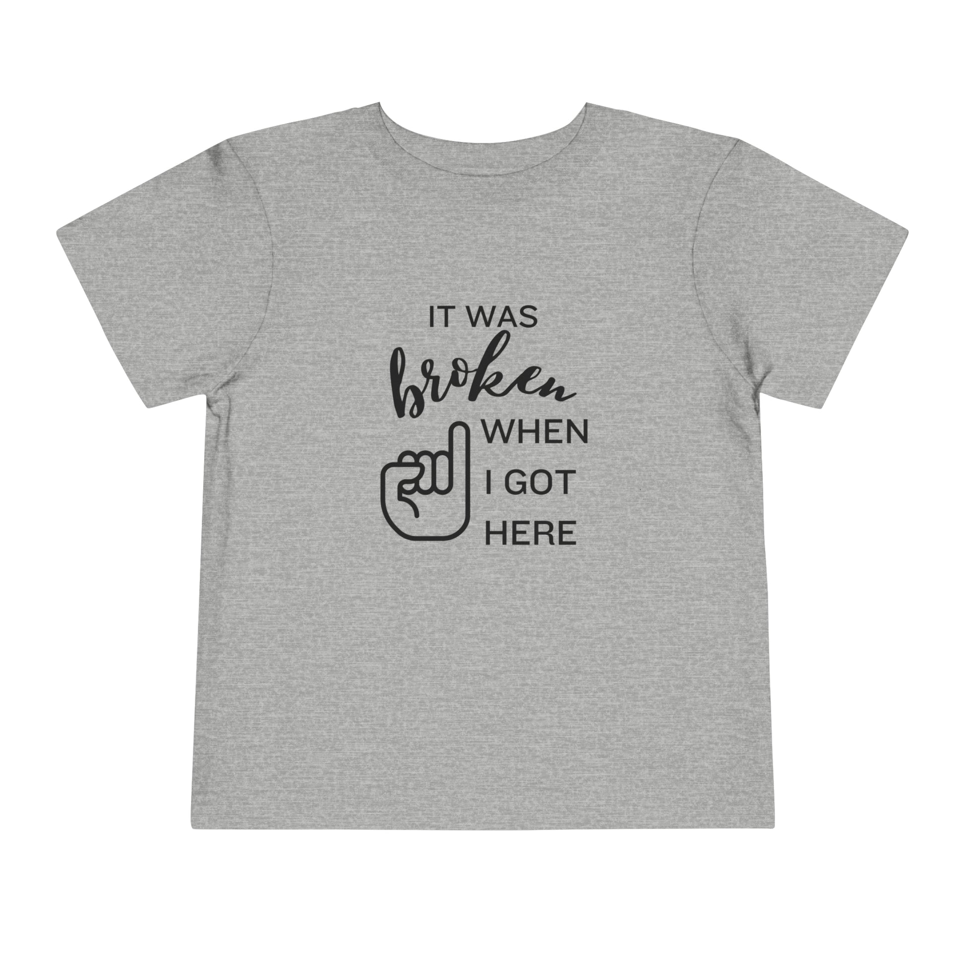 Comfortable funny graphic toddler tee stating 'It was broken when I got here' in color athletic heather