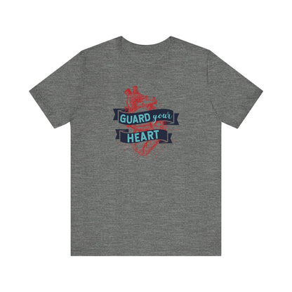 A cotton graphic tee stating 'Guard Your Heart' in color deep heather