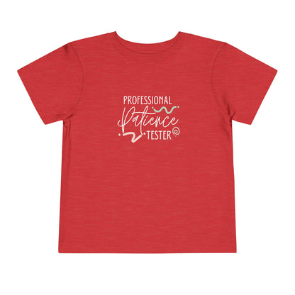 Comfortable funny graphic toddler tee stating 'Professional Patience Tester' in color  heather red