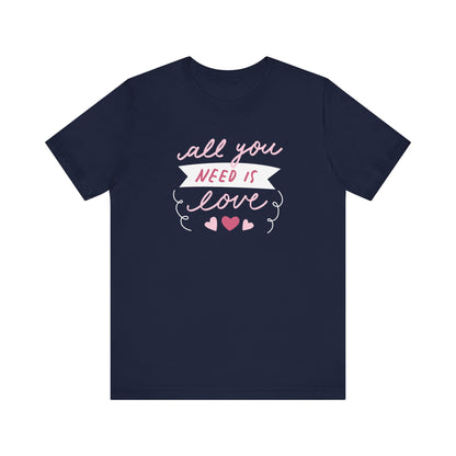 Comfortable Women's Graphic Tee Stating 'All You Need Is Love' in color navy