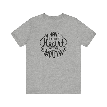 Graphic tee stating 'I have a good heart, but this mouth' in color athletic heather