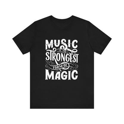 A comfortable good vibes tee stating 'Music is the strongest form of magic' in color black