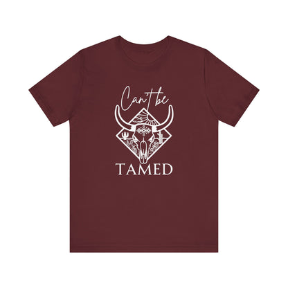 Comfortable Unisex T-Shirt stating 'Can't Be Tamed' in color maroon