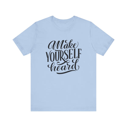 Good vibes graphic tee stating 'Make Yourself Heard' in color baby blue