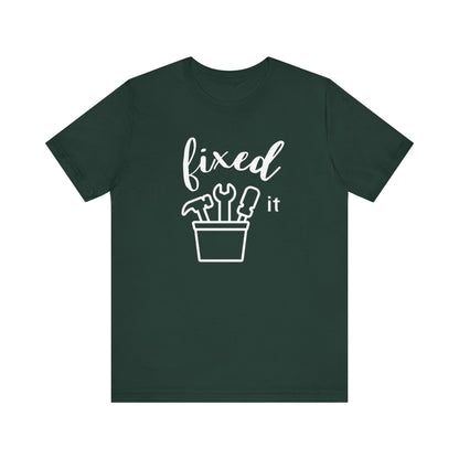 Adult graphic tee stating 'Fixed It' in color forest