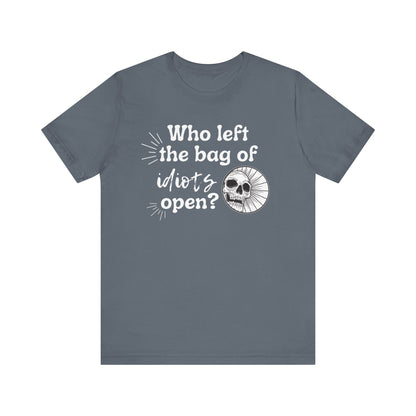 Unisex graphic tee stating 'Who left the bag of idiots open?' in color steel blue
