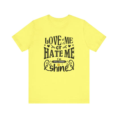 Women's good vibes graphic tee stating 'Love me or hate me, I'm still gonna shine' in color yellow