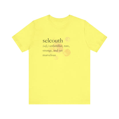 Comfortable women's good vibes tee that states 'selcouth (adj.) unfamiliar, rare, strange, and yet marvelous' in color yellow