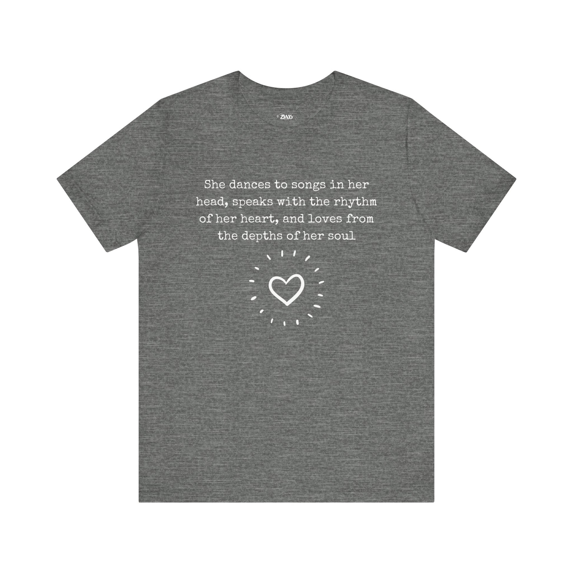 Comfortable good vibes graphic t-shirt stating 'She dances to songs in her head, speaks with the rhythm of her heart, and loves from the depths of her soul' in color deep heather