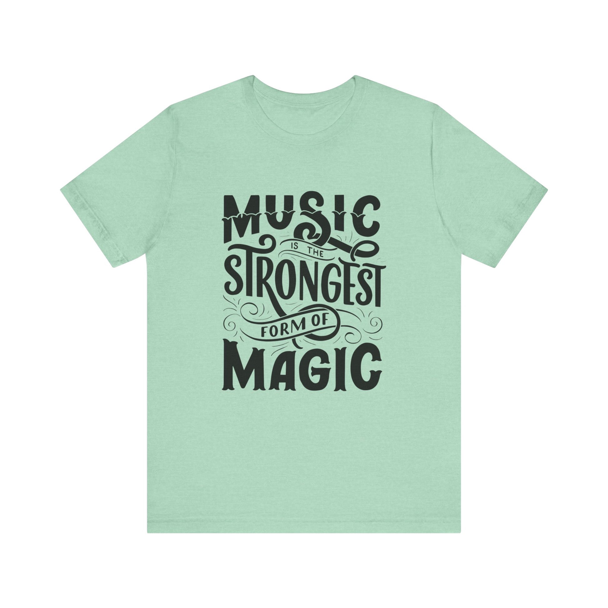 A comfortable good vibes tee stating 'Music is the strongest form of magic' in color mint